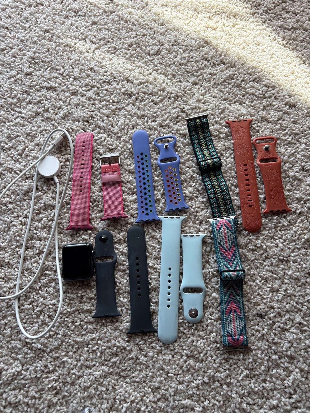 Series 3 Apple Watch with bands and charger